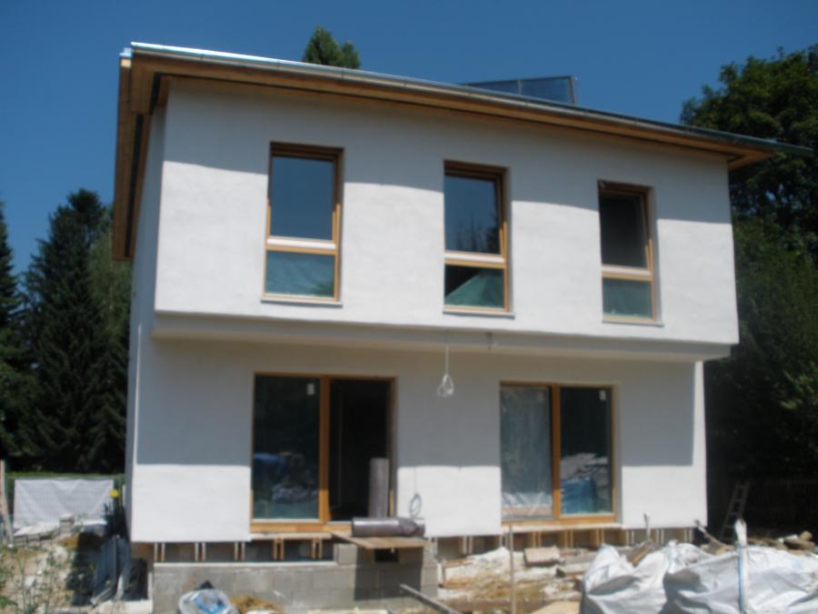 Old brick building with straw façade